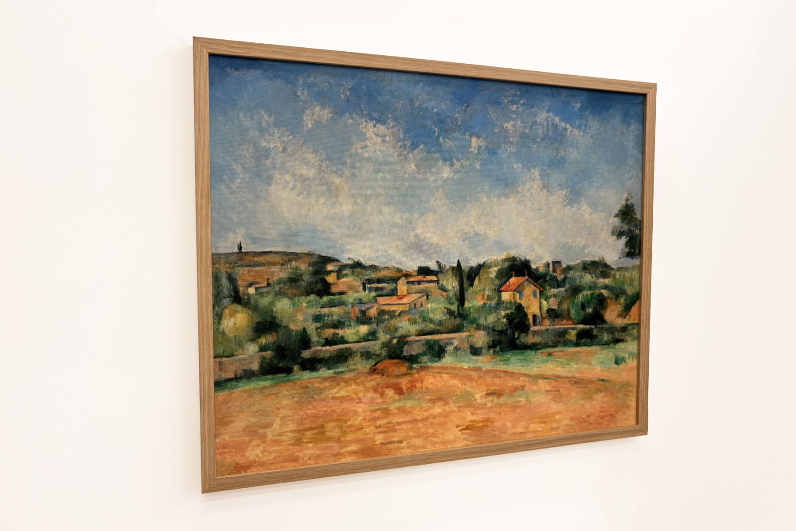 Die Bellevue-Ebene / Die roten Erden (La plaine de Bellevue / Les terres rouges) - Paul Cézanne