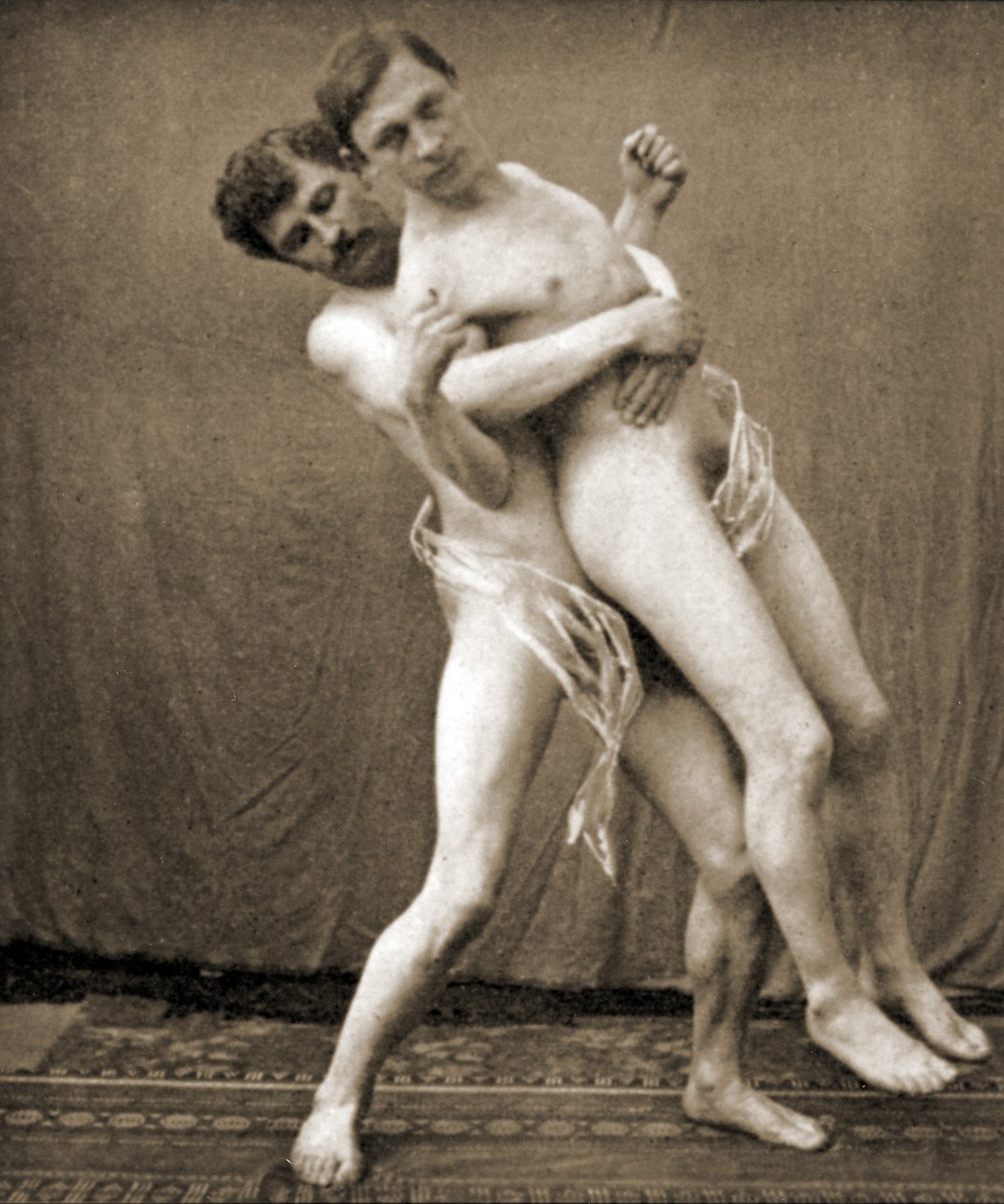 Ringer demonstrieren den Hüftgriff, ca. 1910 von Unknown
