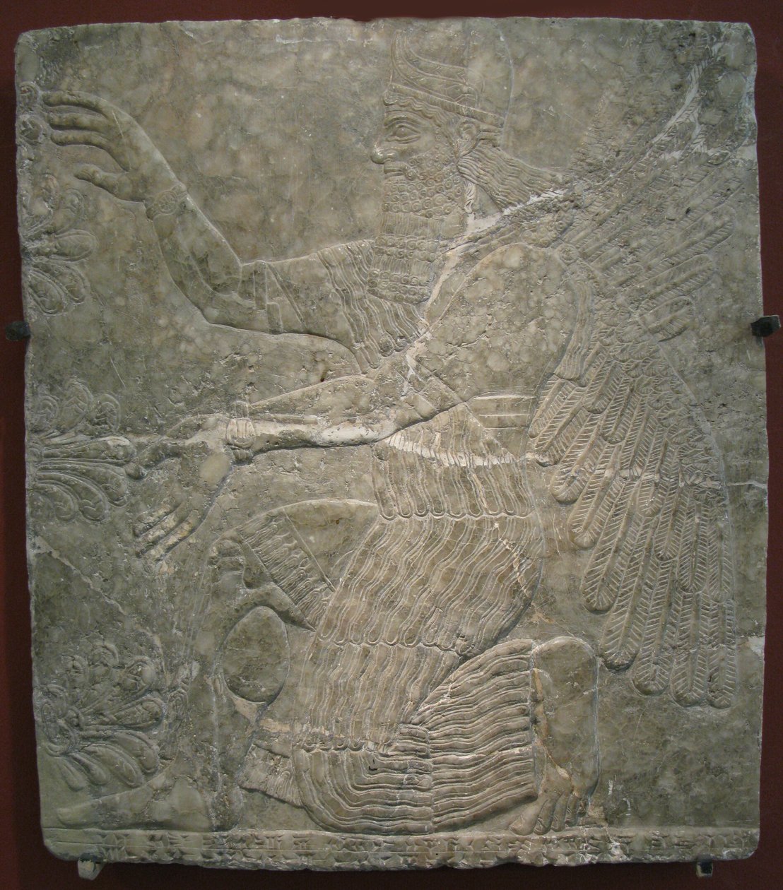 Geflügelte Gottheit am heiligen Baum. Relief aus dem Palast von Ashurnasirpal II. in Kalhu, Nimrud von Assyrian