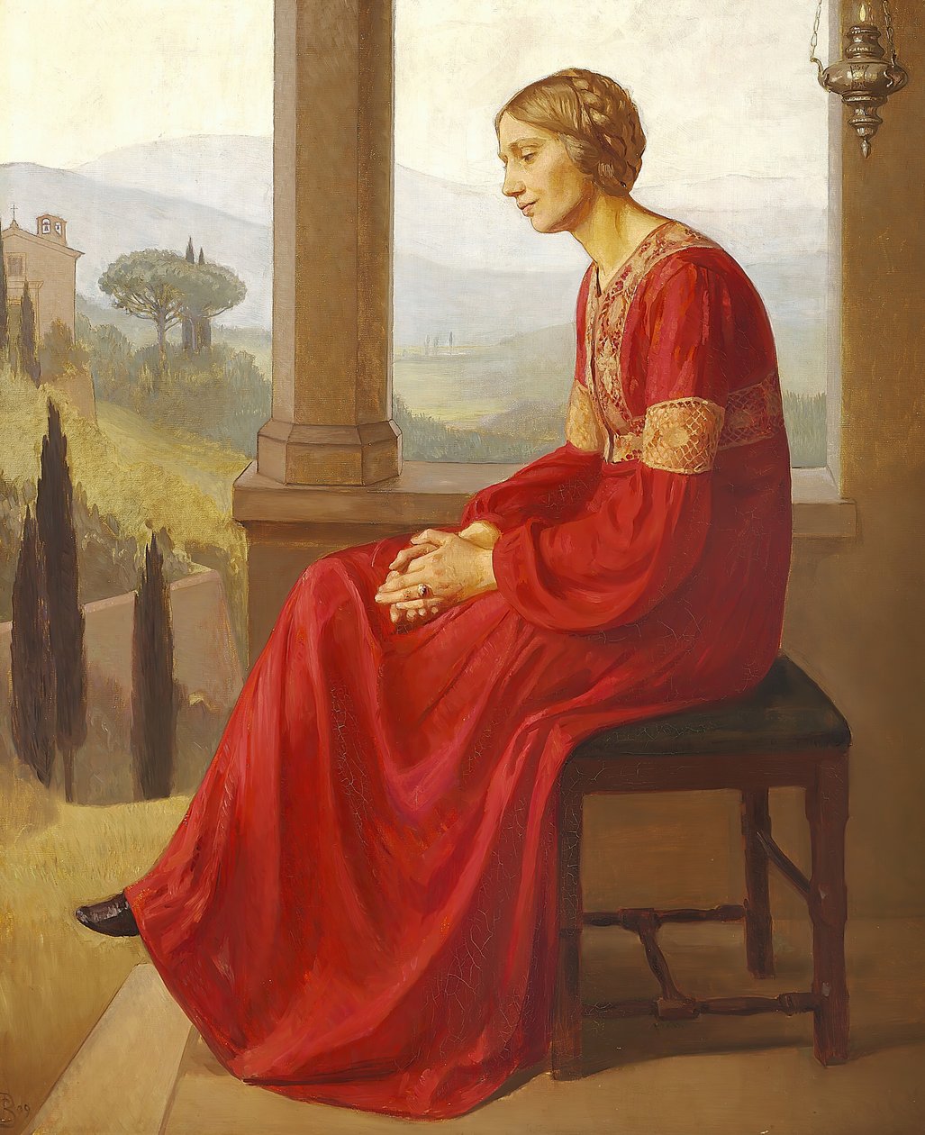 Eine Frau in einem roten Kleid, die auf einer Terrasse in einer italienischen Landschaft sitzt von Christian Bang