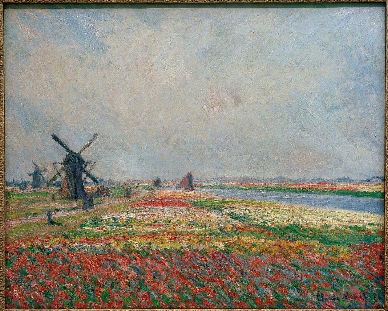 Blumenfelder und Mühlen bei Leiden von Claude Monet
