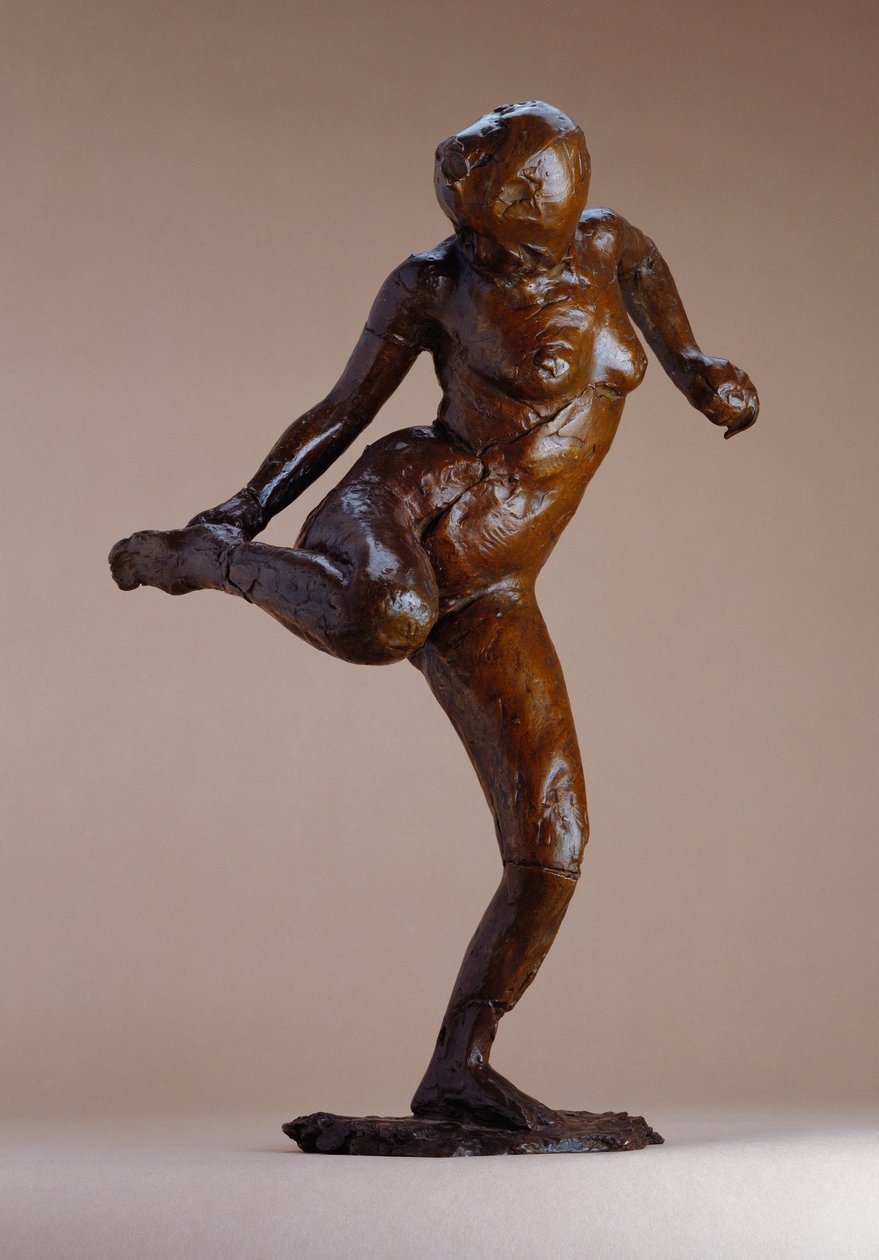 Akt, der auf die Sohle ihres rechten Fußes schaut von Edgar Degas