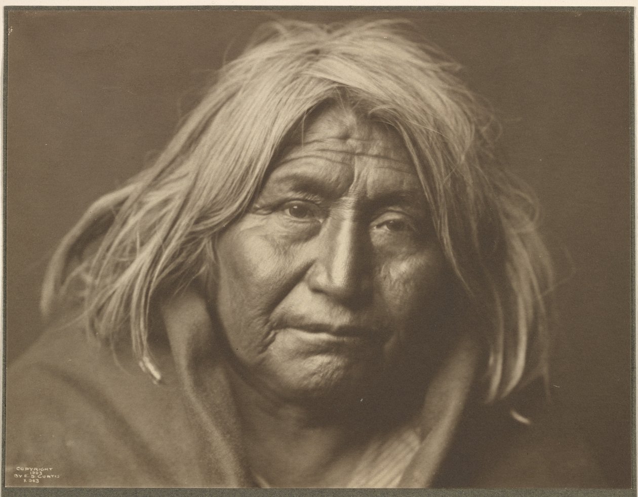 [Ein Apache] von Edward S. Curtis