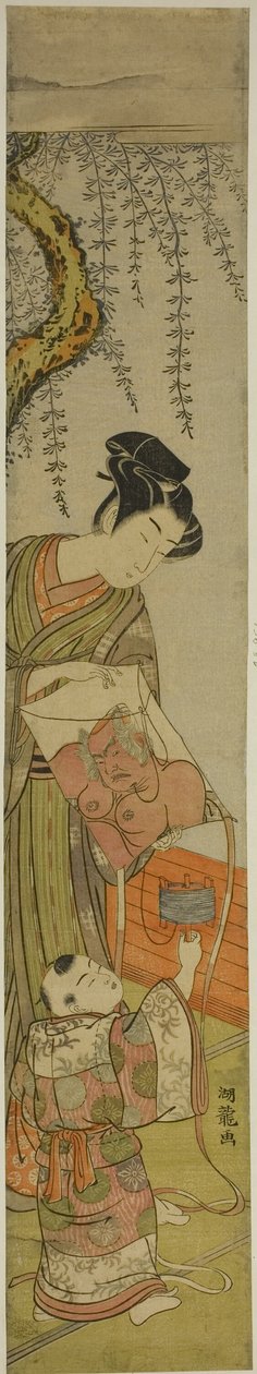 Junger Mann hält einem Kind einen Drachen von Isoda Koryusai