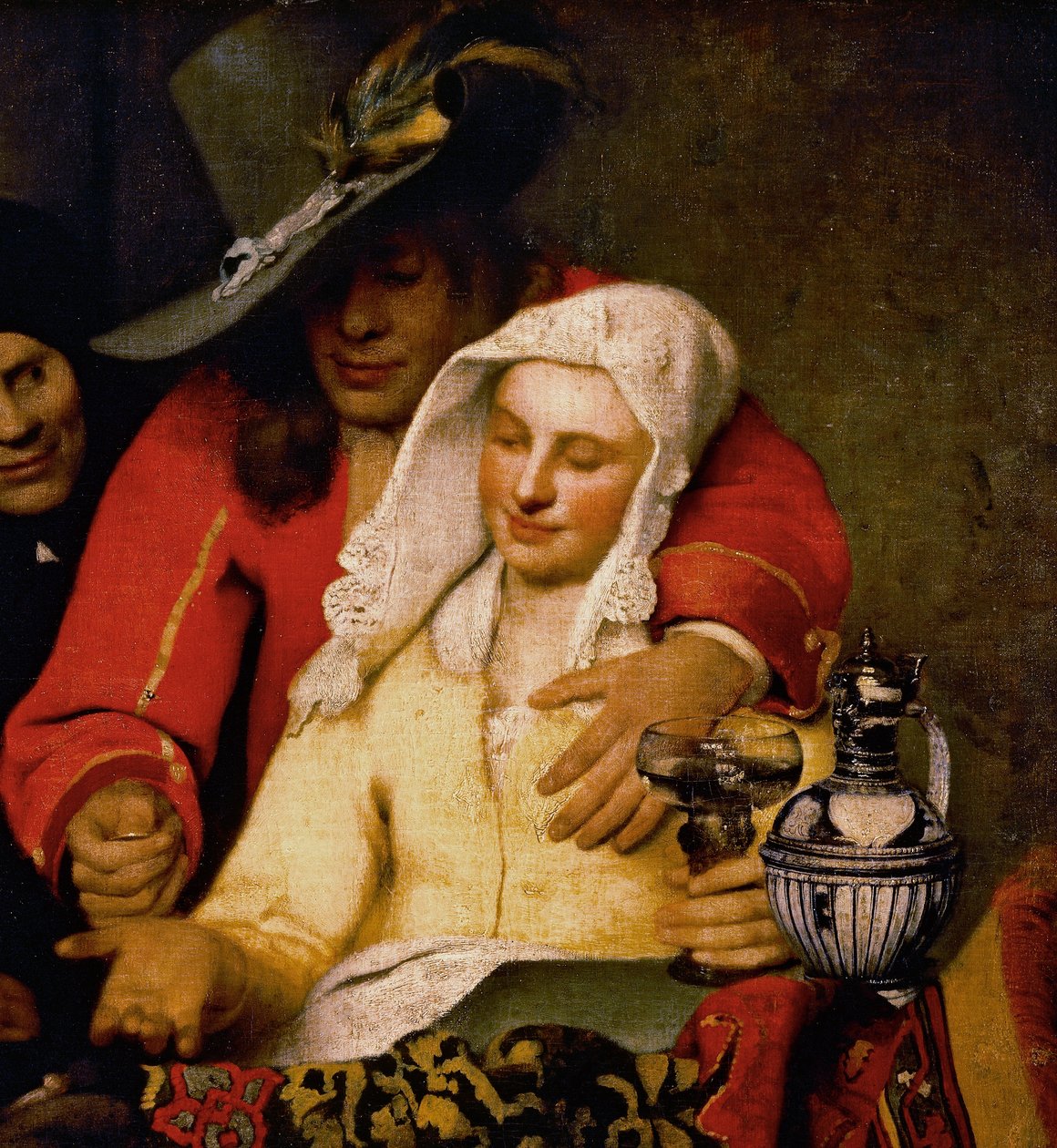Ein Mann hält einer Frau, die ihre Brust berührt, eine Münze hin, Detail aus Die Kupplerin von Johannes Vermeer