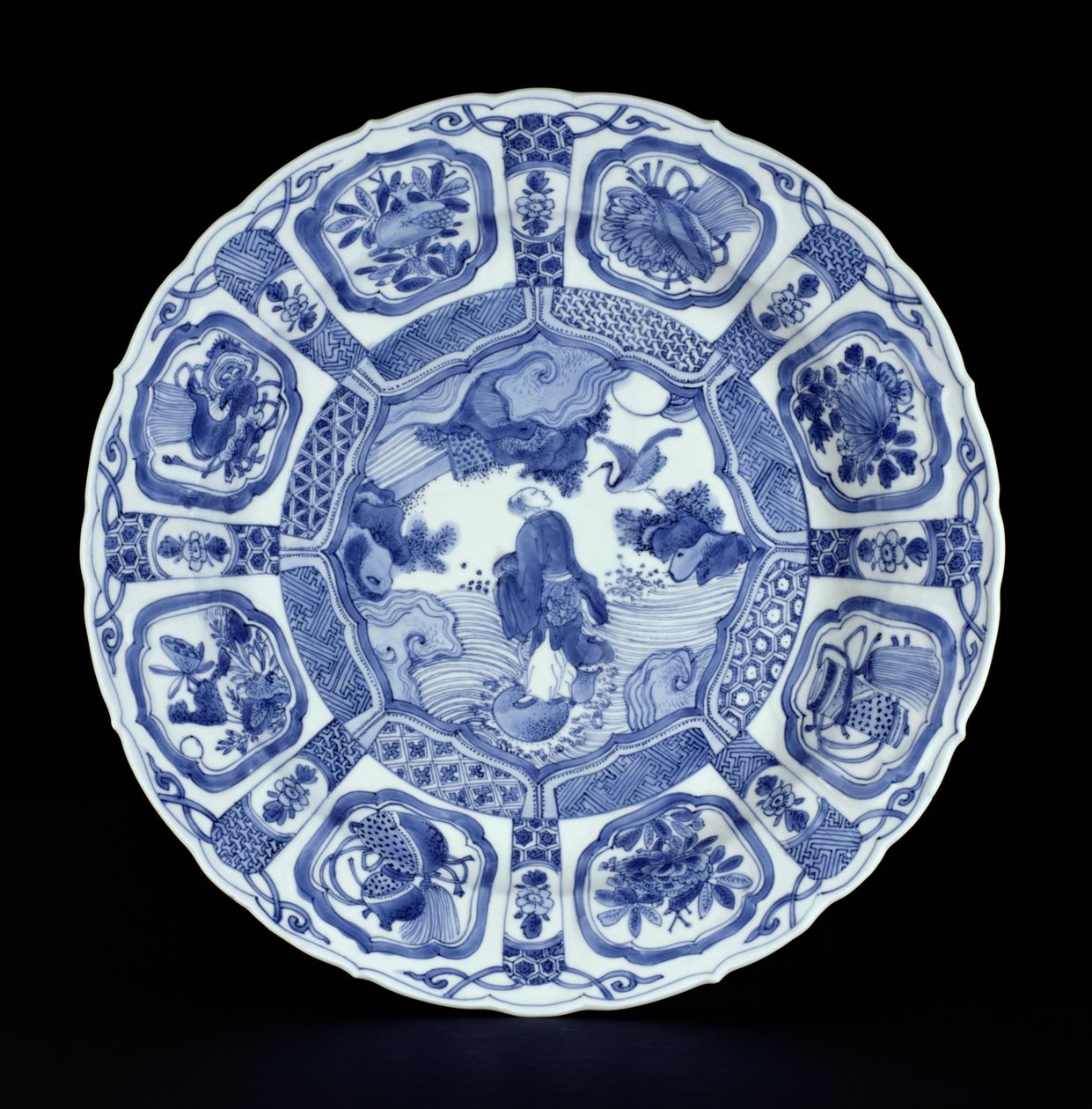Blau-weiße Kraak-Platte mit Li Tiegvai, der das Meer auf einem Doppelkürbis überquert, Wanli-Periode, 1594-1610 (Porzellan) von Ming Dynasty Chinese School