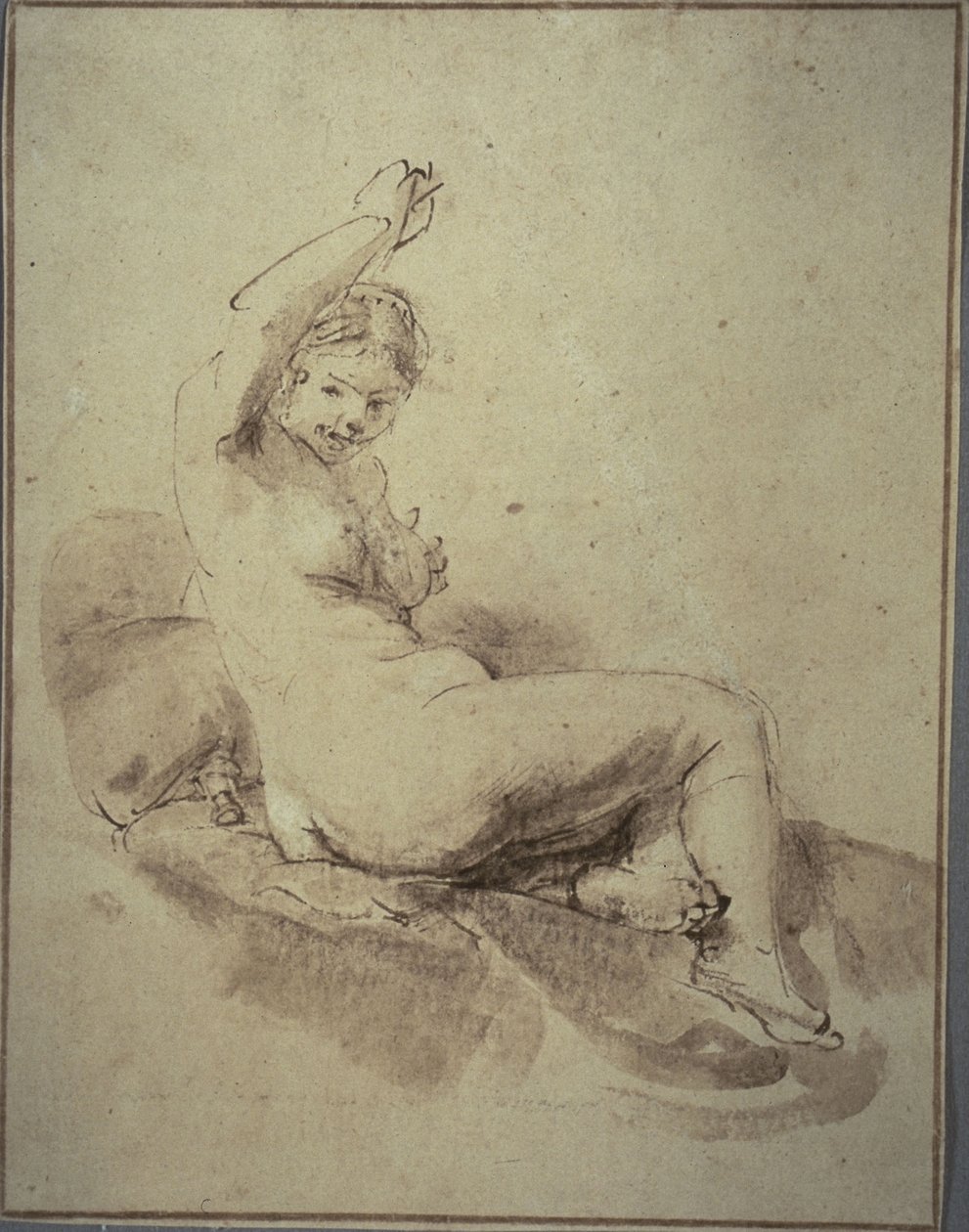 Weiblicher Akt liegend mit erhobenem Arm von Rembrandt Harmensz. van Rijn
