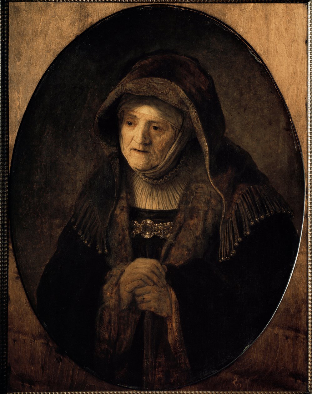 Porträt der Mutter des Künstlers, die sich auf ihren Stock stützt von Rembrandt van Rijn