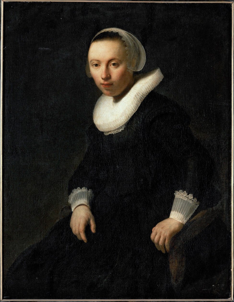 Junge Frau, die in einem Stuhl sitzt von Rembrandt Harmensz. van Rijn