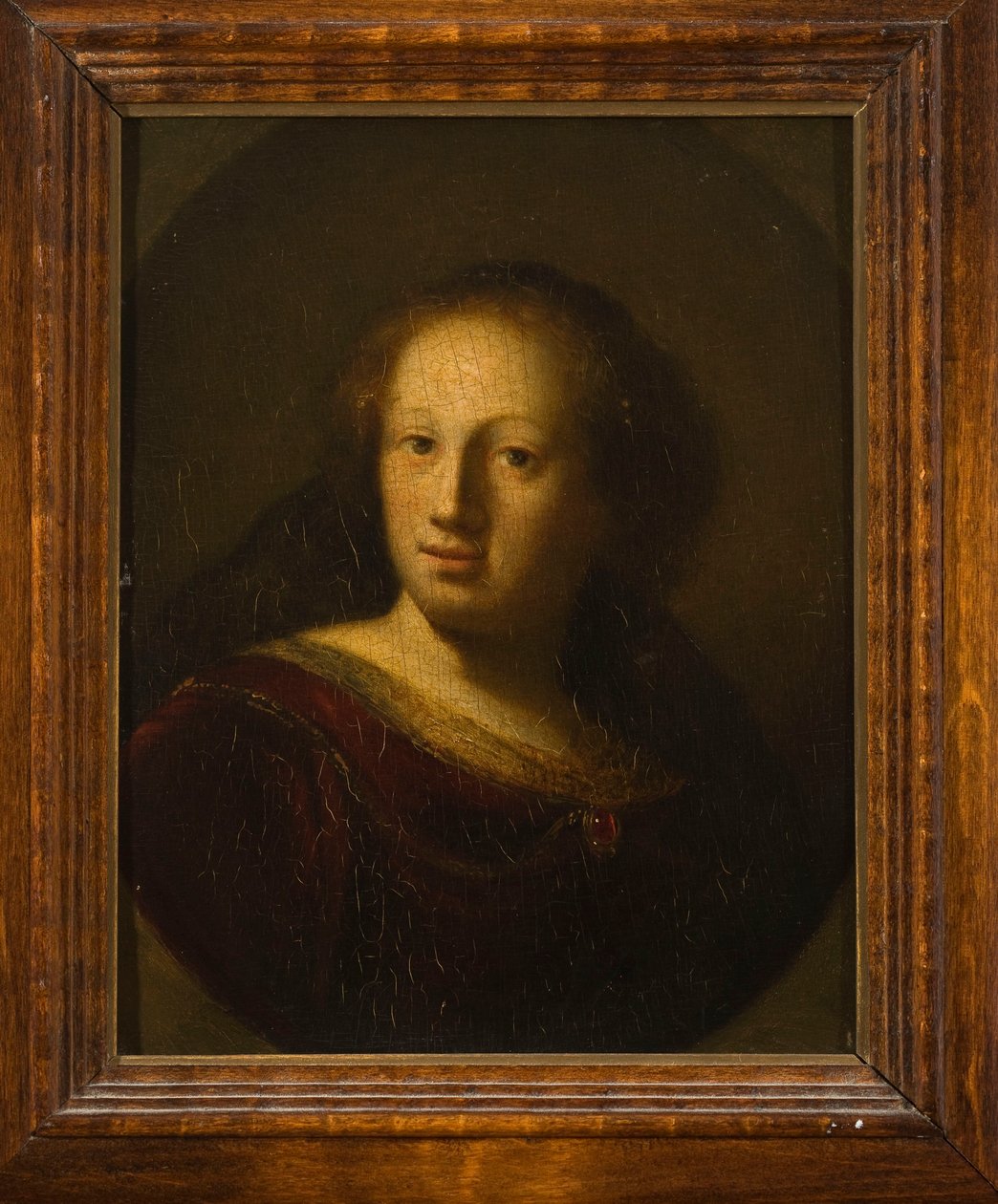 Porträt einer Frau mit rubinrotem Anhänger von Rembrandt van Rijn