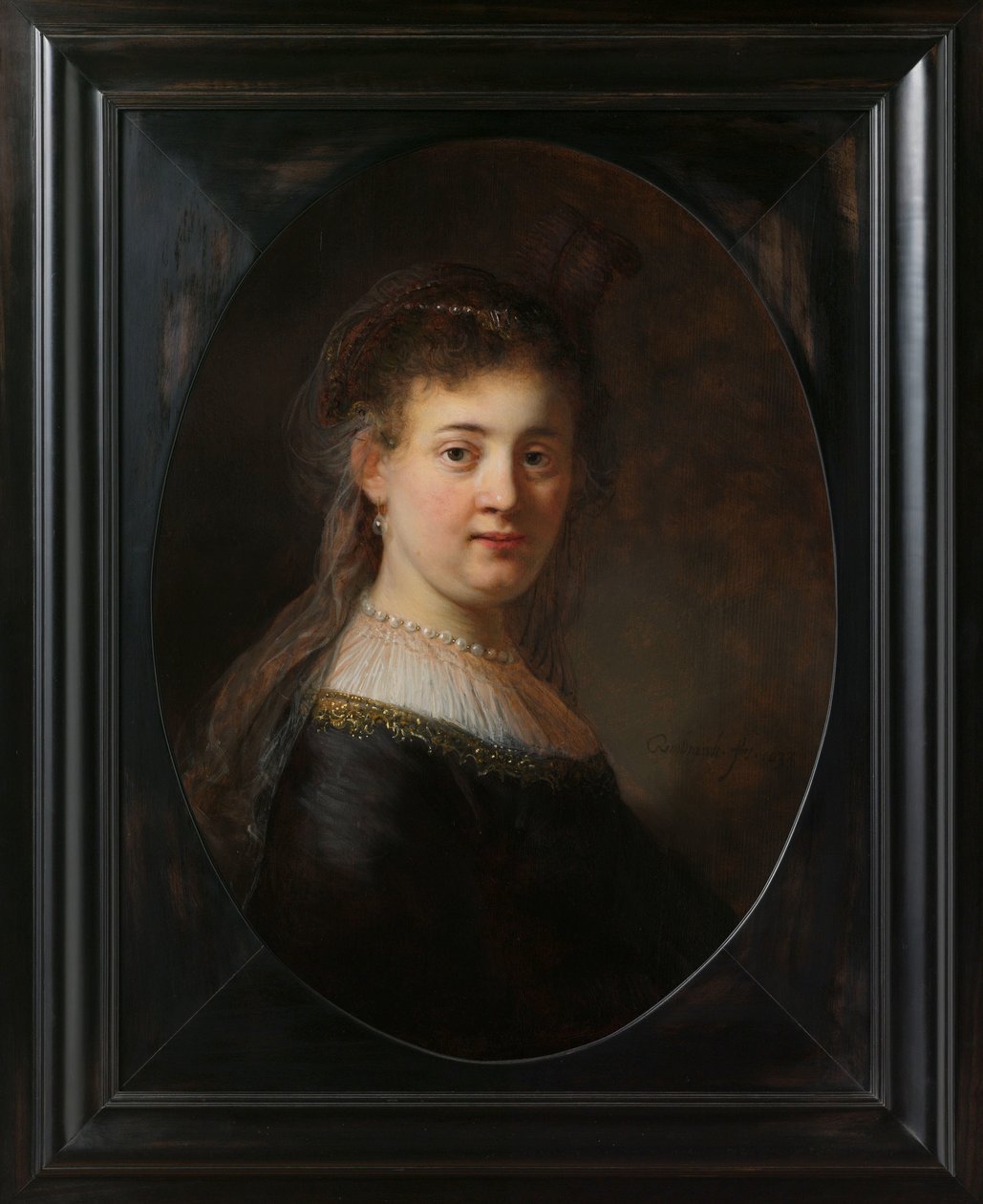 Junge Frau in Fantasiekostüm von Rembrandt van Rijn