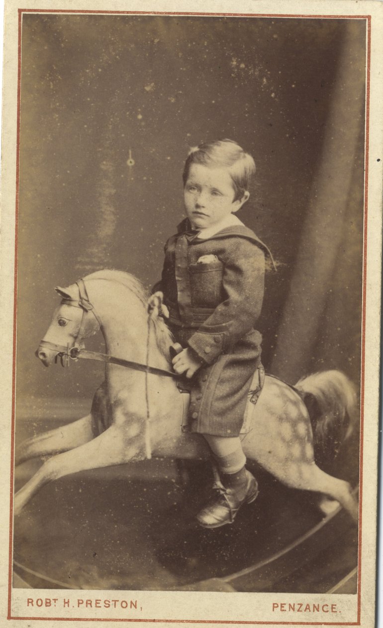 Junge auf einem Schaukelpferd von Robert H. Preston
