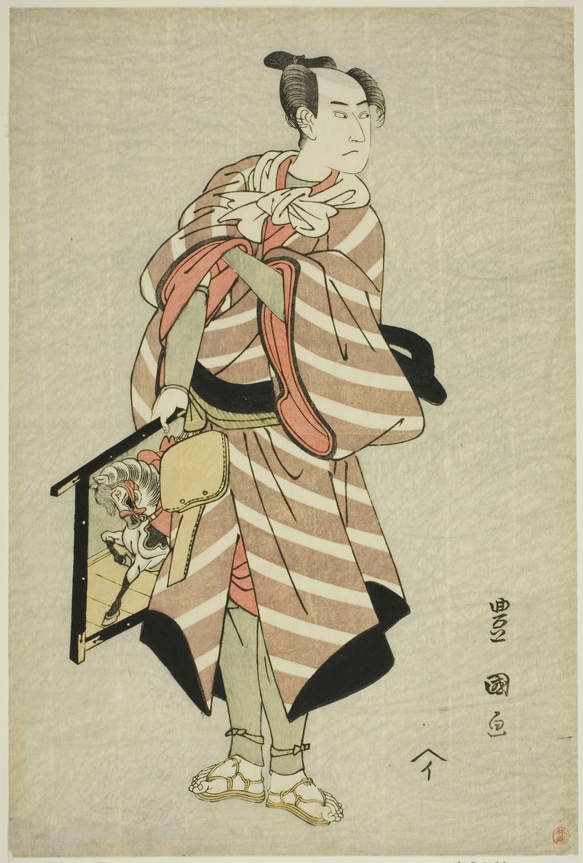 Der Schauspieler Sawamura Sojuro III als Packpferd-Mann Muchizo im Stück "Miyamairi Musubi no Kamigaki," aufgeführt im Kiri-Theater im elften Monat, 1797 von Utagawa Toyokuni I