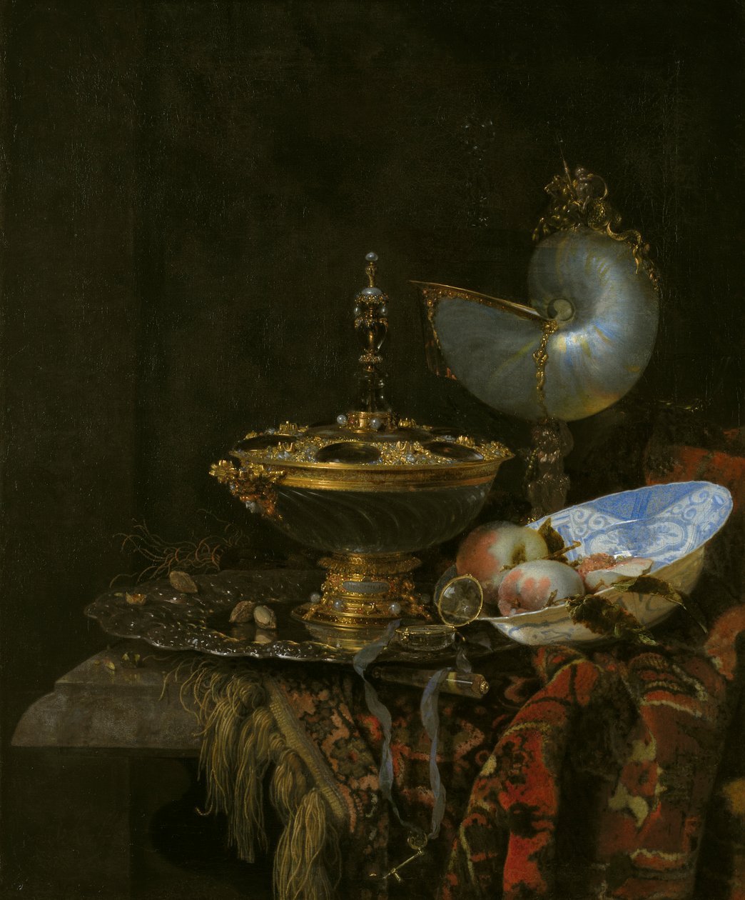 Prächtiges Stillleben mit Holbein-Schale, Nautilus und Glaspokal und Obstschale von Willem Kalf