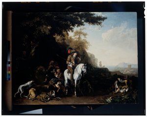 Weite Landschaft mit einer Jagdgesellschaft, die an einem Wassertrough rastet, und einem Sportschützen, der schießt