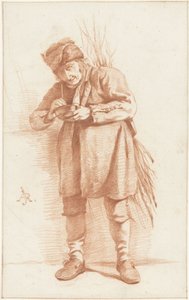 Stehender Mann mit Pfeife und Reisigbündel