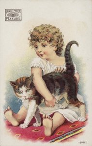 Mädchen spielt mit Katze auf Teppich