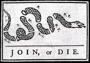 Join or Die, Zeichnung, gilt als der erste politische Cartoon, veröffentlicht in der „Pennsylvania Gazette“ von Benjamin Franklin im Jahr 1754. Es stellt eine in mehrere Abschnitte geteilte Schlange mit der Legende „Join or Die“ dar. Dies ist ein Appell an