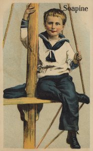 Matrosenjunge sitzt auf Takelage von American School