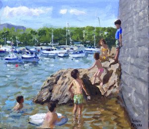 Klettern auf Felsen, Hafen von Tenby, 2016