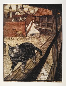 Eine getigerte Katze geht entlang des Holzgeländers eines Gebäudes