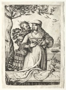 Soldat umarmt eine Frau