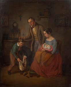 Familie bei der Nikolo-Bescherung