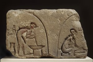 Sandsteinrelief der Zubereitung einer Mahlzeit