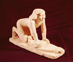 Modell eines Dieners, der Getreide mahlt, Altes Reich, aus Saqqara