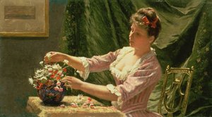 Junge Frau arrangiert Blumen