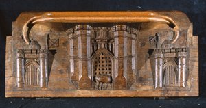 Eine Miserikordie, die das Pferd von Sir Yvain zeigt, das gefangen ist, als das Fallgatter eines aufwendigen Burgtors gesenkt wird, New College Chapel, Oxford, spätes 14. Jahrhundert