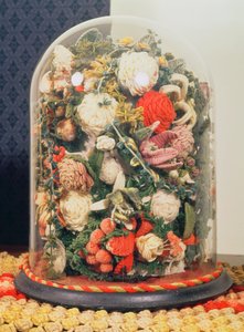 Viktorianische Wollblumen in einem Glaskasten