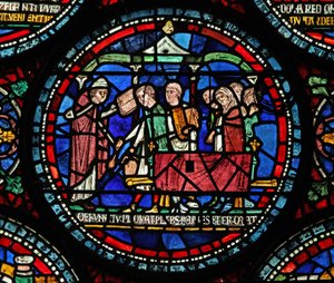 Fenster s6, Szene aus einem St. Thomas Becket Wunderfenster: Beerdigung von Gilbert de Brun (?)