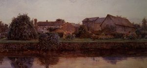 Ein Haus und Bauerngebäude an einem Fluss