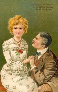 Mann hält die Hand einer jungen Frau
