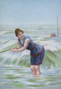 Frau badet am Meer