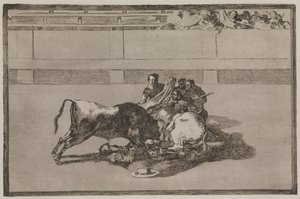 Ein Picador wird vom Pferd geworfen und stürzt unter den Stier