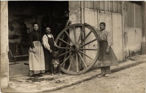 Der Wagen, Hersteller von Trolleyrädern. Postkarte Anfang des 20. Jahrhunderts