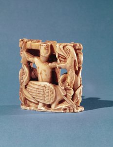 Schachfigur in Form eines Ritters, der gegen einen Drachen kämpft