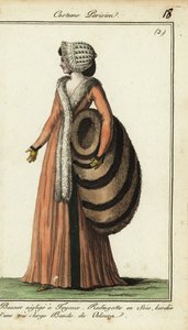 Modische Frau mit riesigem Pelzmuff