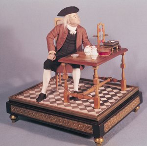 Modell von Benjamin Franklin (1706-90) an seinem Tisch, spätes 18. Jahrhundert