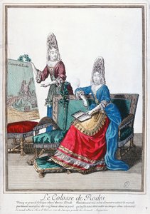 Dame zeigt ein Bild des Koloss von Rhodos
