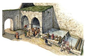Mittelalter: Rekonstruktion eines Brunnenhauses in Mittelitalien im 15. Jahrhundert. Es wird als Waschhaus, Wasserstelle und Wasserpunkt für die Stadtbewohner genutzt von Giorgio Albertini