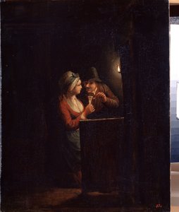 Ein Mann und eine Frau bei Kerzenlicht