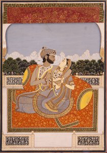 Ein Paar umarmt sich auf einer Terrasse von Indian School