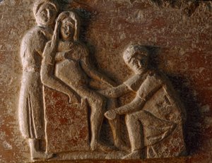 Ein Relief aus dem Grab eines römischen Mannes und seiner Frau zeigt eine Frau bei der Geburt. Museo A...
