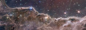 Kosmische Klippen im Carinanebel (NIRCam und MIRI Kompositbild)