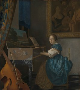 Eine junge Frau sitzt an einem Virginal von Johannes Vermeer