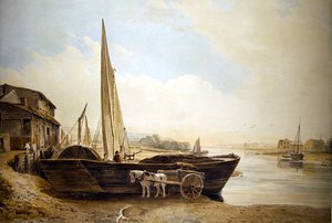 Eine am Ufer liegende Themse-Barke zum Entladen