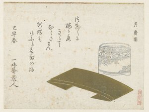 Ein Porzellantopf und gefaltetes Papier